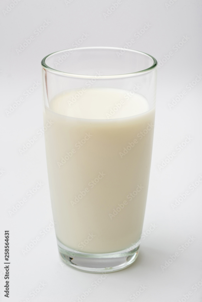 glass of milk on a white background glass of milk on a white background