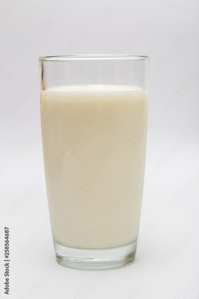 glass of milk on a white background glass of milk on a white background