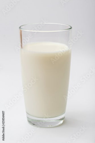 glass of milk on a white background