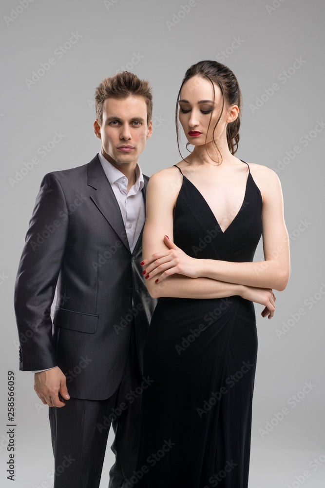 Young beautiful couple in evening wear Young beautiful couple in evening wear