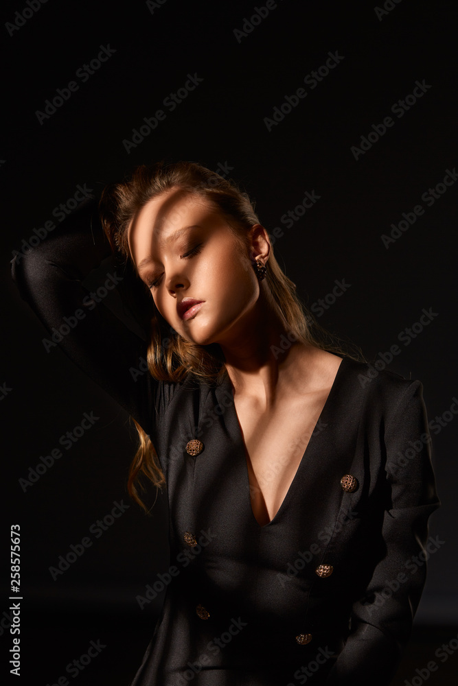 Surrealist portrait. Dramatic portrait of a girl in the dark. Fashion sexy girl. .. Surrealist portrait. Dramatic portrait of a girl in the dark. Fashion sexy girl. ..