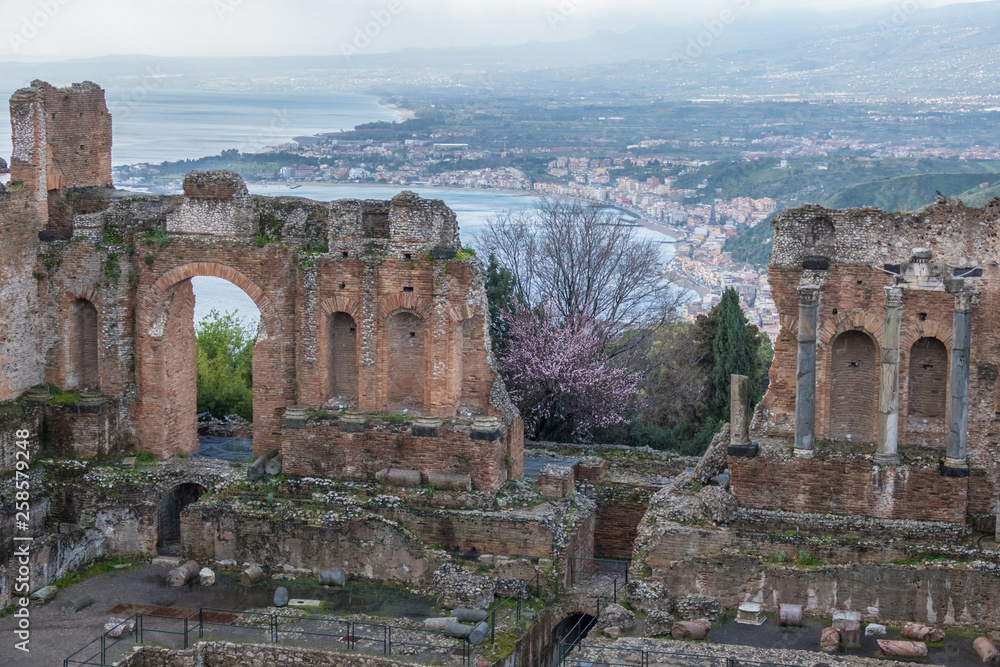 Ruins of Ancient Greek Theater of Taormina (Tauromenion in Greek), Metropolitan area of Messina, Eastern Sicily, Italy. Founded by Greek colonists from Naxos
