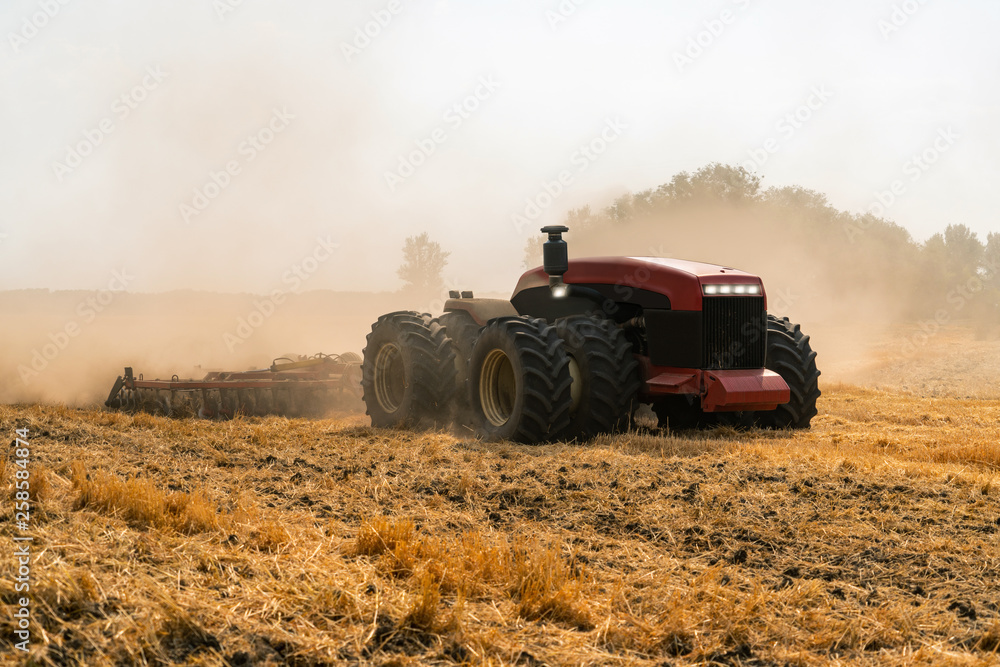 Autonomous tractor working on the field. Smart farming Autonomous tractor working on the field. Smart farming