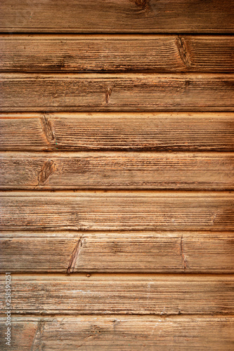 Old Dark rough wood floor or surface with splinters and knots. Brown oak wood texture. background old panels