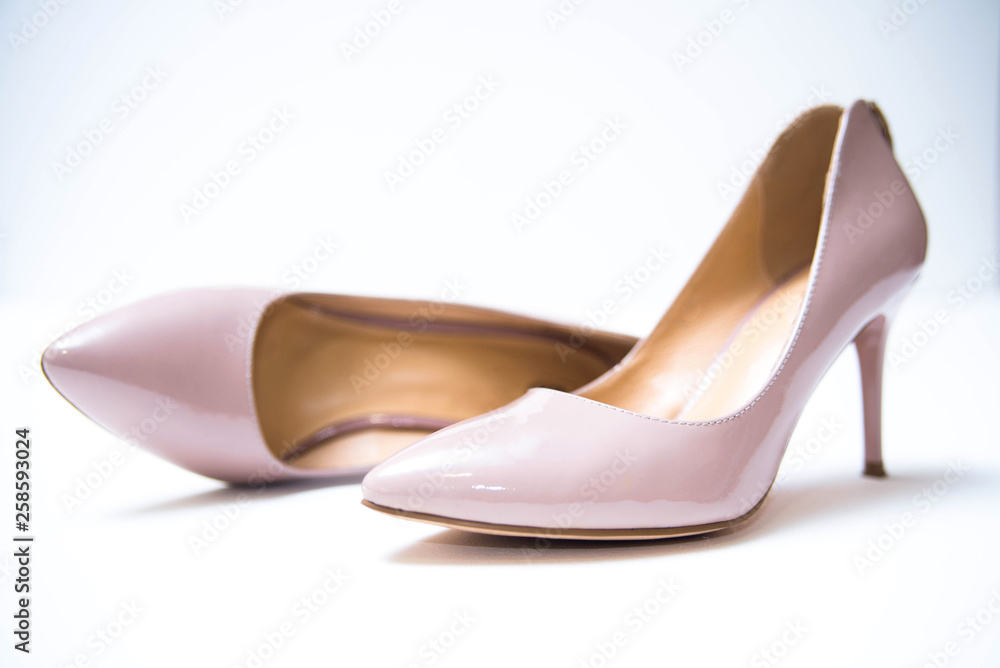 Women's beige shoes on isolation Women's beige shoes on isolation