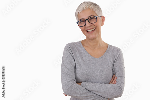 Happy Smiling Mature Woman wearing glasses on white background.