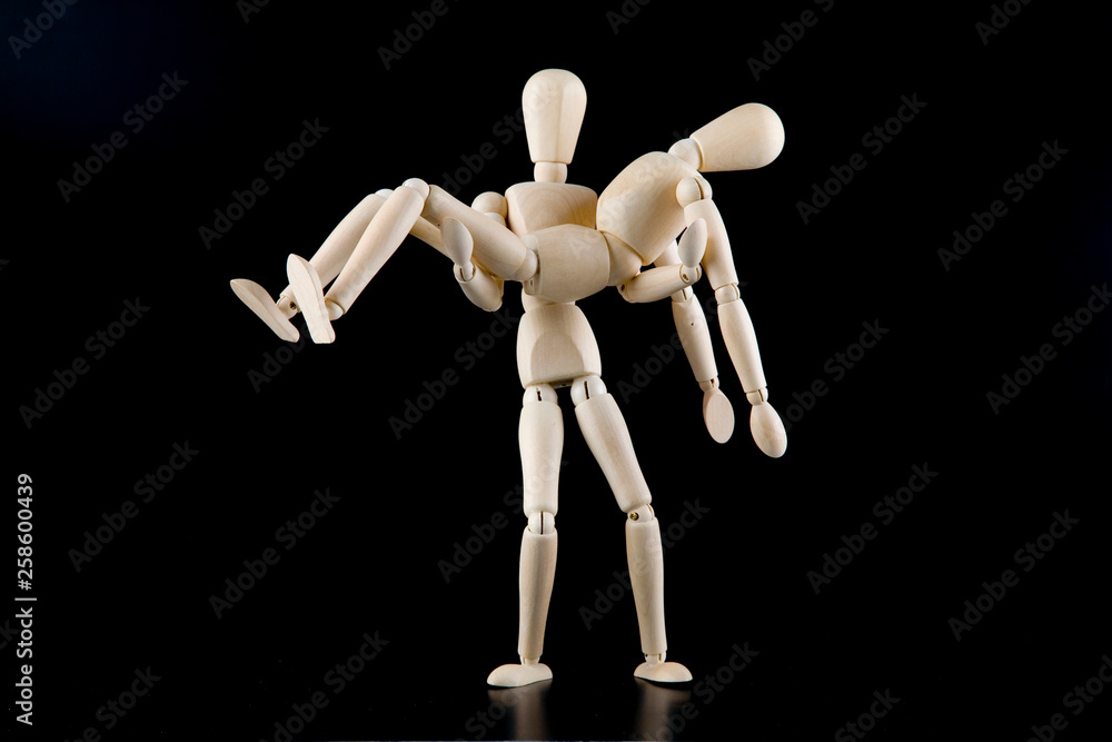 Mannequin dolls in interaction isolated on black background Mannequin dolls in interaction isolated on black background