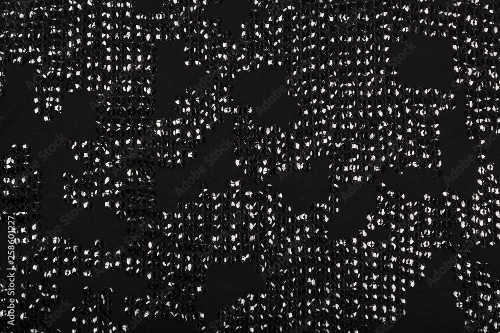 Black fabric with shiny reflective sequins