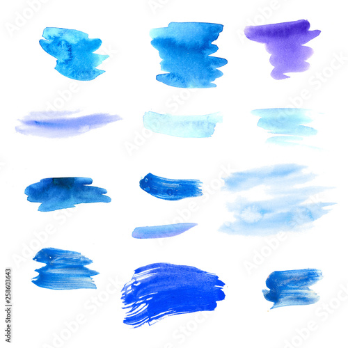 Set of turquoise and blue cosmetic watercolor brush strokes isolated on white.