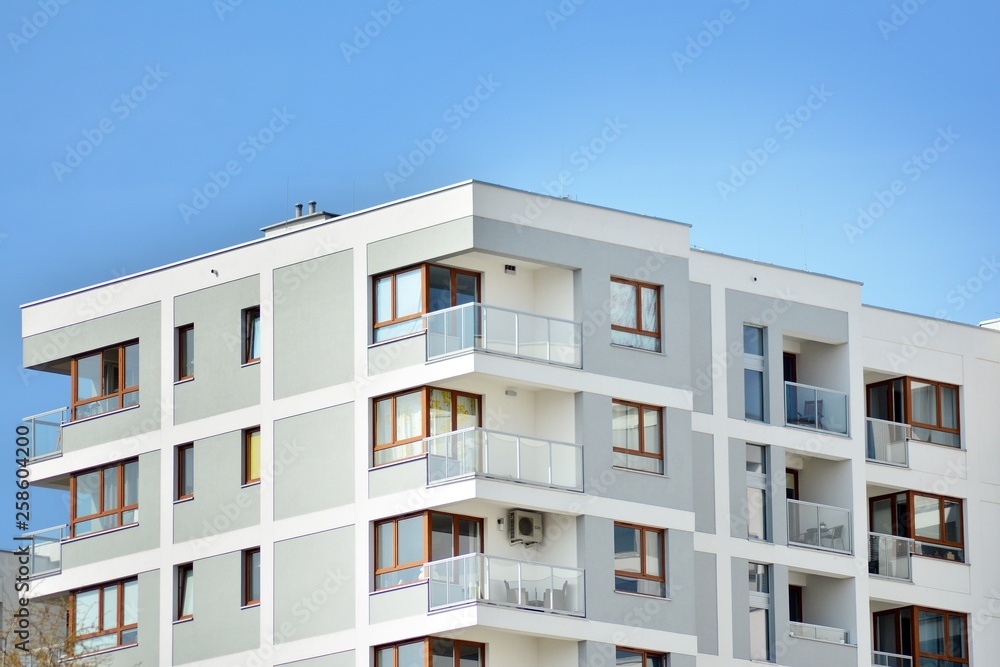 Fragment of a modern apartment building in front. Very modern apartment house. Fragment of a modern apartment building in front. Very modern apartment house.