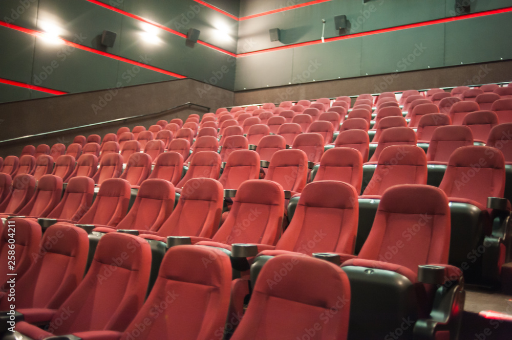 Fototapeta premium part of a theatre, or similar building, where the people who are watching and listening sit