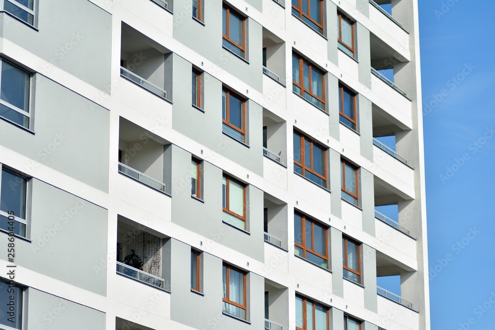 Fragment of a modern apartment building in front. Very modern apartment house. Fragment of a modern apartment building in front. Very modern apartment house.