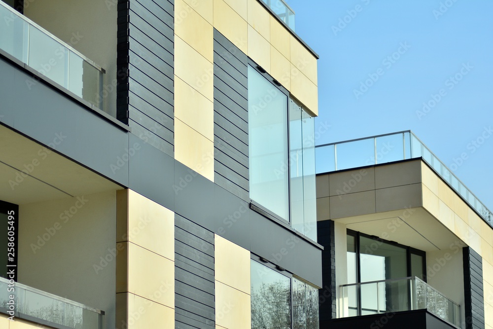 Fragment of a modern apartment building in front. Very modern apartment house. Fragment of a modern apartment building in front. Very modern apartment house.