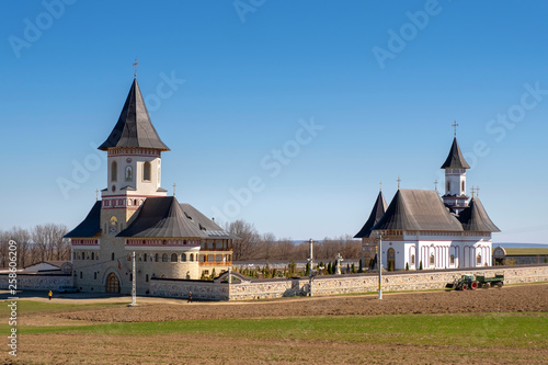 Zosin monastery in Moldavia on a sunny day in spring. Wide view photo