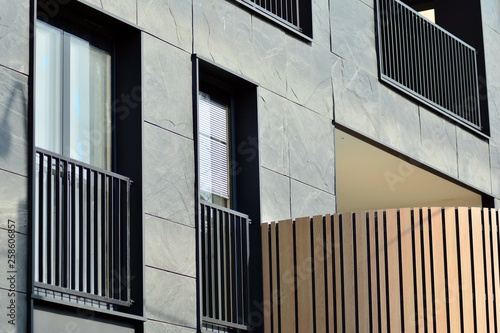 Fragment of a modern apartment building in front. Very modern apartment house.