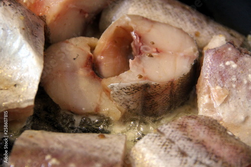 Fish fried in a frying pan