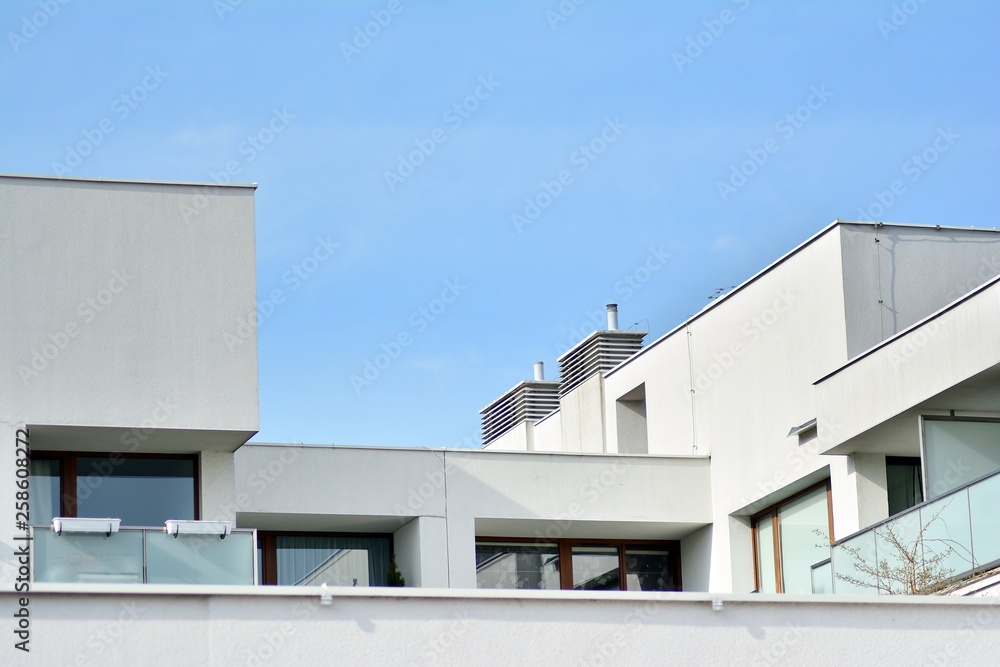 Fragment of a modern apartment building in front. Very modern apartment house. Fragment of a modern apartment building in front. Very modern apartment house.
