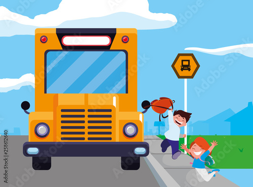 happy little school kids in the bus stop © djvstock