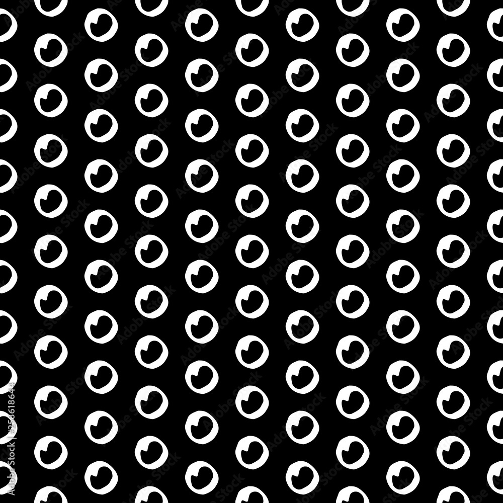 Abstract cute pattern with hand drawn polka dots. Trendy vector black and white cute pattern. Seamless monochrome cute pattern for fabric, wallpapers, wrapping paper, cards and web backgrounds.