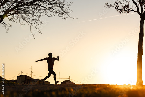 Silhouette of Man Running.