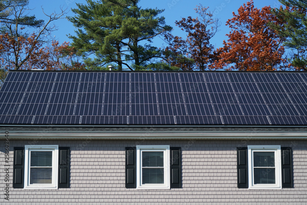 Fototapeta premium solar panel installed on the house roof
