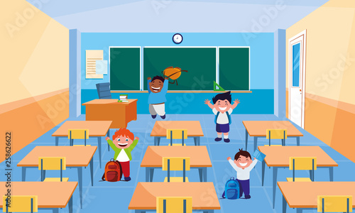 happy little interracial boys in the classroom