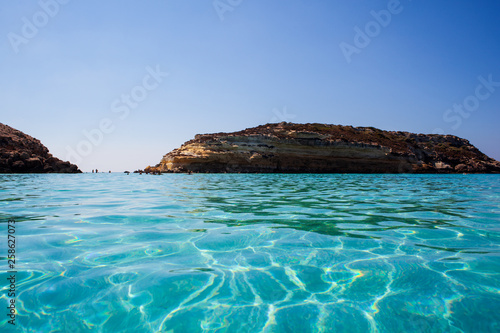 View of the most famous sea place of Lampedusa called Spiaggia dei conigli, photo