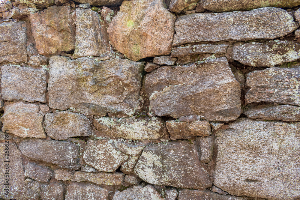 Fototapeta premium old stone wall of stones