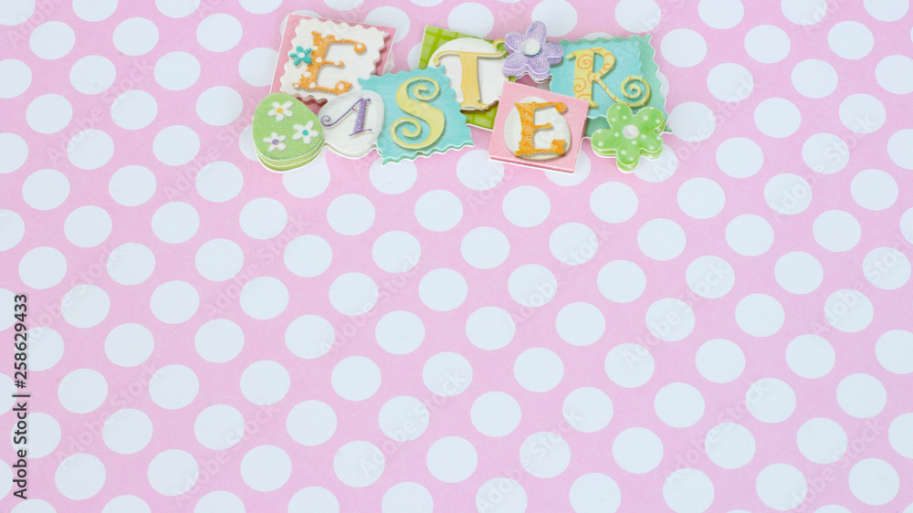 Easter banner on white polka dotted background with writing space