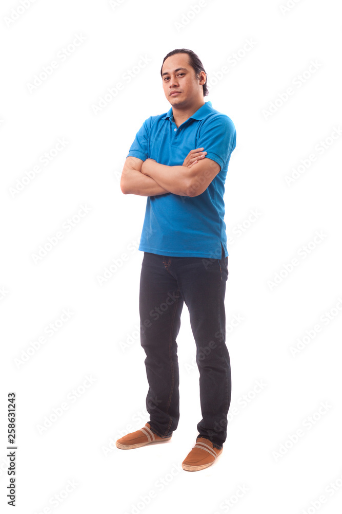 Young Man Smiling With Arms Crossed Young Man Smiling With Arms Crossed