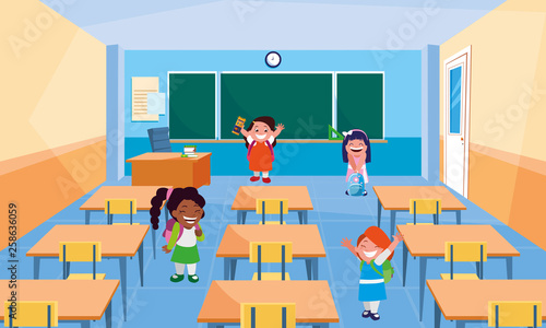happy little school interracial girls in the classroom