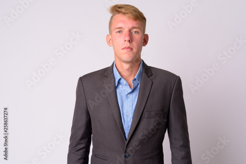 Portrait of young blonde businessman with suit © Ranta Images