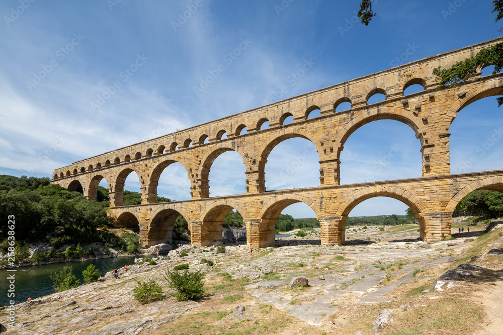 The magnificent three tiered Pont Du Gard aqueduct was constructed by Roman engineers in the 1st century AD in the south of France