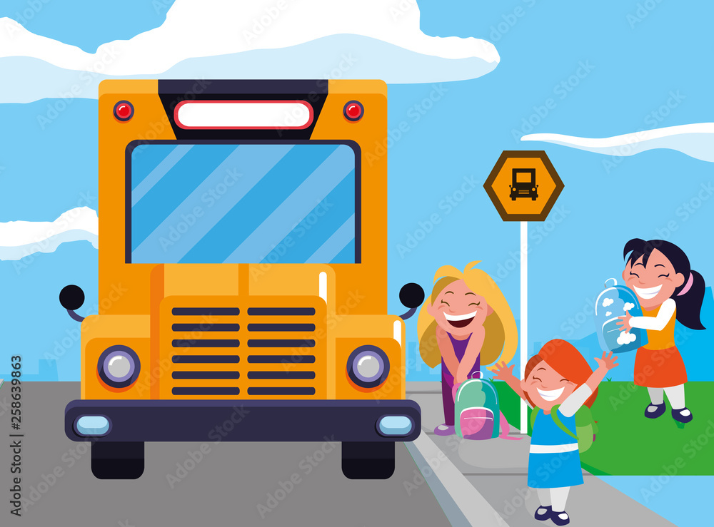 happy little school girls in the bus stop happy little school girls in the bus stop