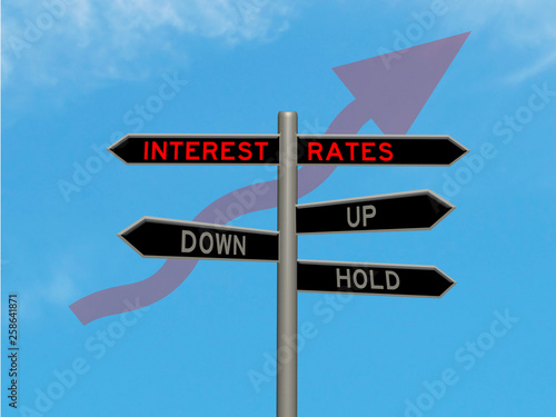 Interest rates concept 3d sign on a signpost against a blue sky background with a diagonally upward pointed red arrow
