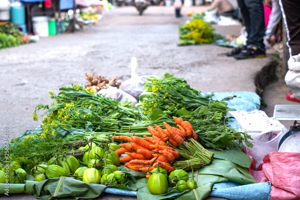 Various types of vegetable selling at local market in the morning in Thailand.