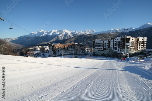 Winter view of the mountains and hotels in the ski resort Rosa Khutor, Sochi, Russia.