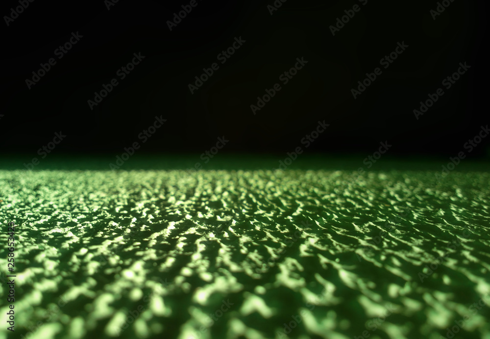 Low angled green concrete texture background hd