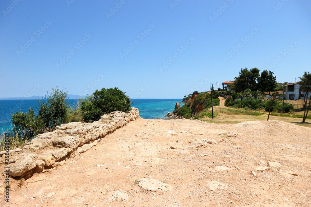 Road to azure Mediterranean sea, Greece Road to azure Mediterranean sea, Greece