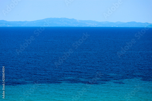 Azure mediterranean sea and bright blue sky, Greece