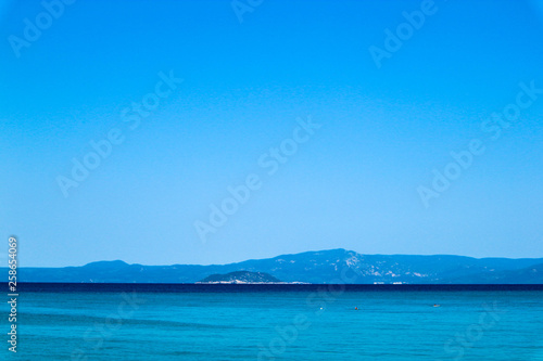 Azure mediterranean sea and bright blue sky, Greece