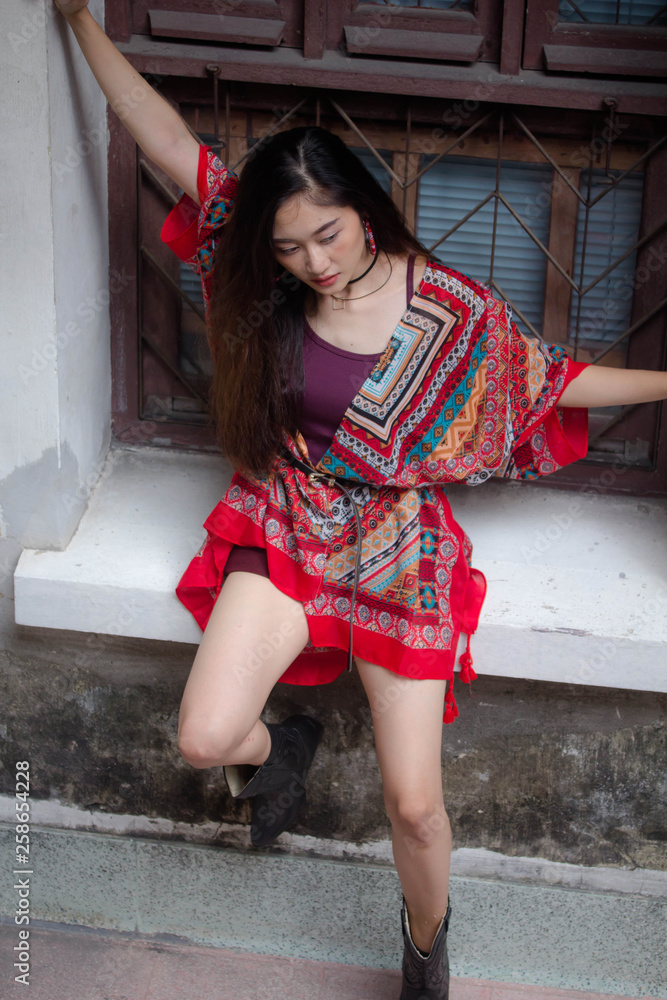 Fototapeta premium Portrait of thai china adult bohemian girl relax and smile