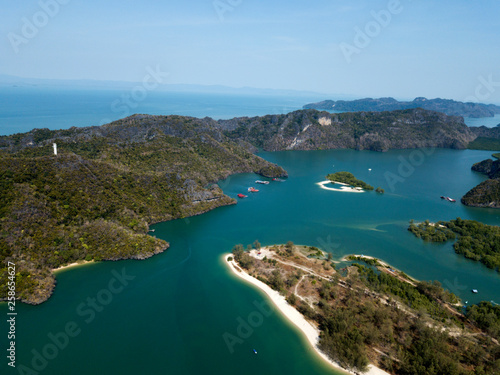 Aerial view of Kilim Geoforest Park. There is sea, river, coastline, mangroves and mountains on the photo. Langkawi, Malaysia.