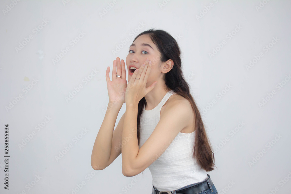 Portrait of thai china adult beautiful girl White shirt blue jeans Shout Portrait of thai china adult beautiful girl White shirt blue jeans Shout