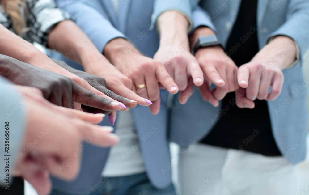 close-up of multi-racial hands