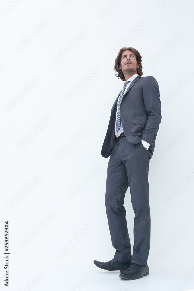 Pensive business man looking up