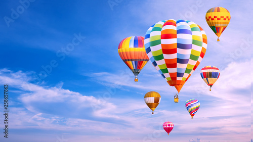 Colorful hot air balloon fly over blue sky 1