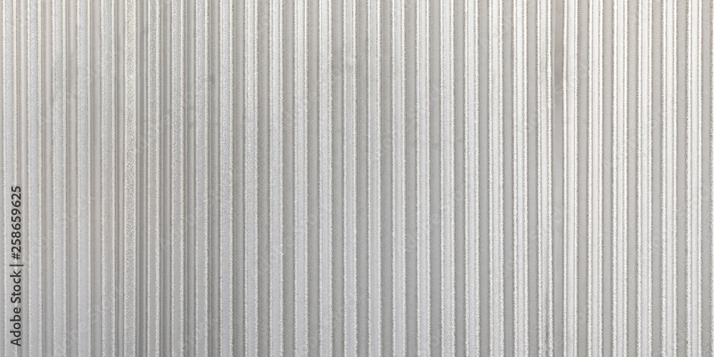 The corrugated grey metal panorama wall background. Rusty zinc grunge texture and background. The corrugated grey metal panorama wall background. Rusty zinc grunge texture and background.