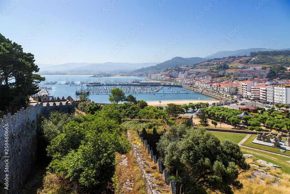 Baiona, Spain. View of the city and boat port from the wall of the Monterreal fortress