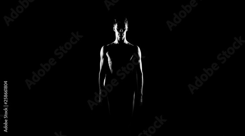 Black and white silhouette of male ballet dancer. Long monochrom horizontal image.